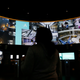 Spyscape’s surveillance room shows a grid of live and pre-recoded crowd-monitoring footage from around the world.